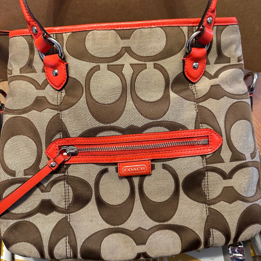 Signature red/orange Shoulder Bag with crossbody strap and wristlet